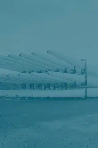 Large solar panel array in an open field under a clear sky